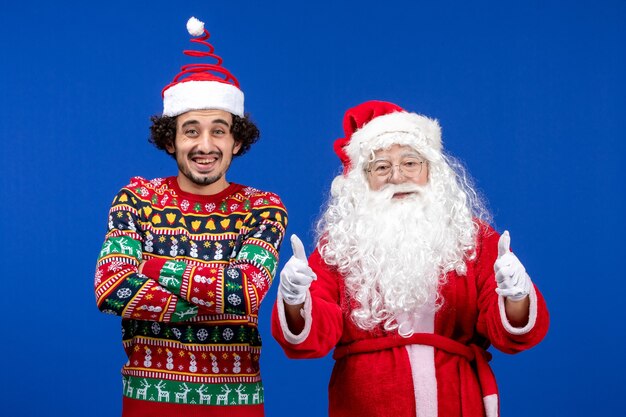 Front view santa claus with young male