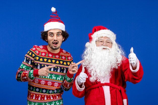 Front view santa claus with young male