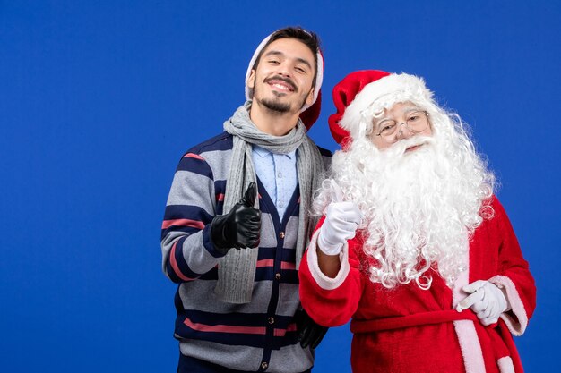 Front view santa claus with young male