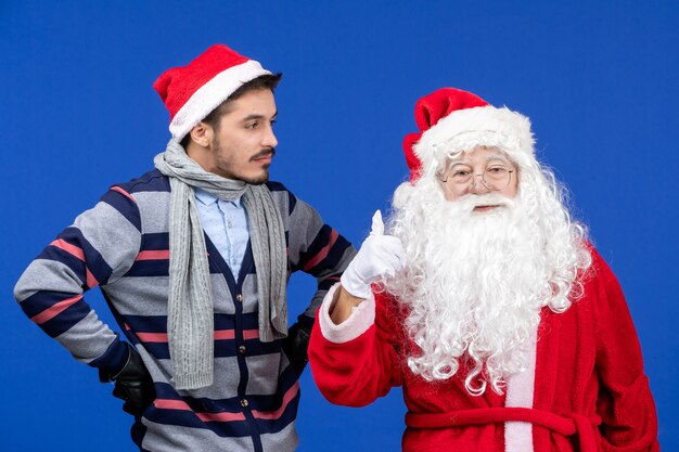 Front view santa claus with young male