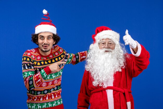 Front view santa claus with young male