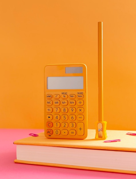 Front view school supplies on the table composition