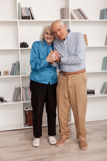 Free photo front view senior man and woman together