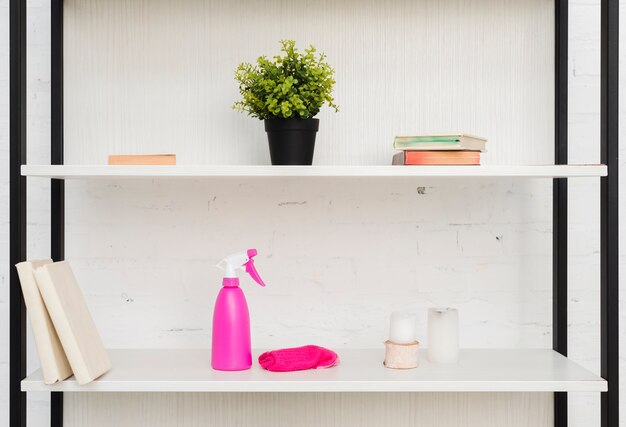 Free Photo front view shelves with plants