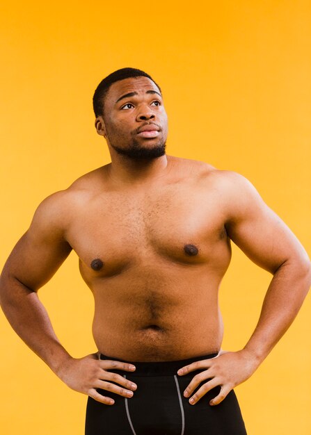 Front view of shirtless athletic man