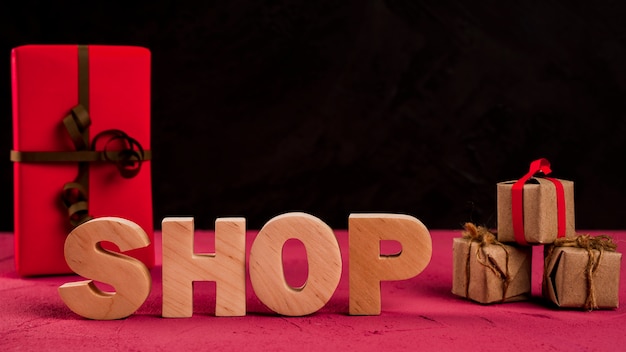 Front view of shop word on red table