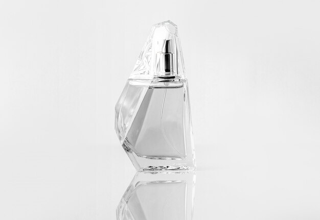 A front view silver bottle designed isolated on the white wall