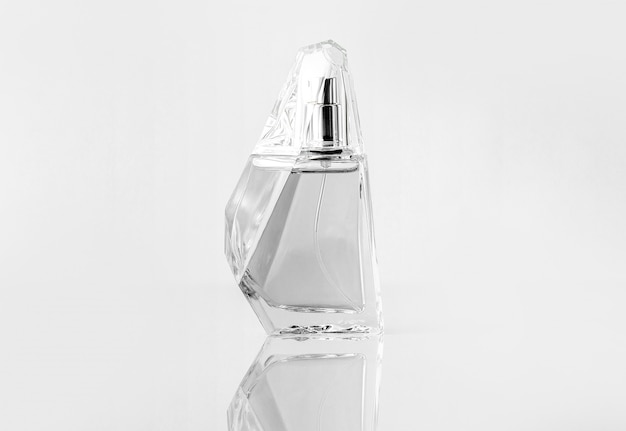 A front view silver bottle designed isolated on the white wall