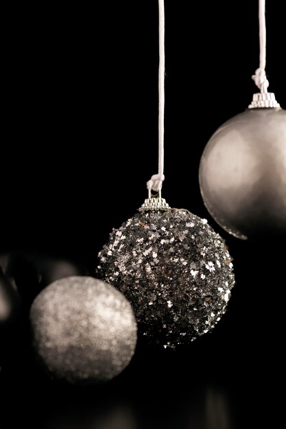 front view of silver christmas ornaments