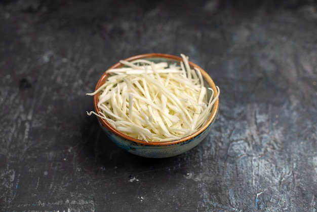 Front view sliced cabbage on light-grey table