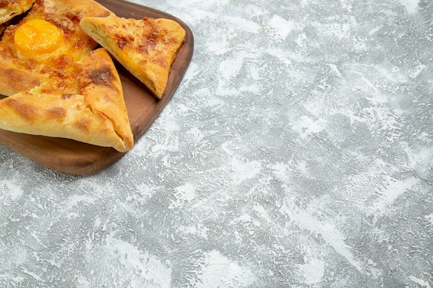 Front view sliced egg pastry baked bread on a white space