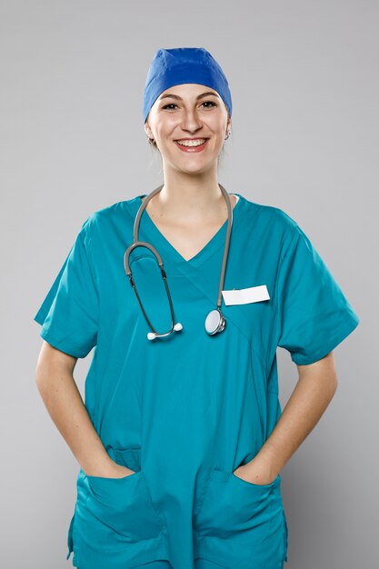 Front view of smiley female doctor