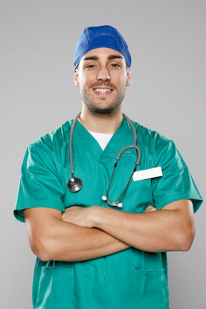 Front view of smiley male doctor