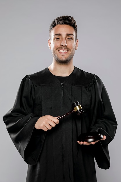 Front view of smiley male judge