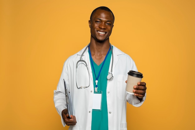 Front view smiley man holding coffee cup