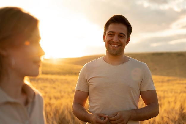 Front view smiley man looking at woman