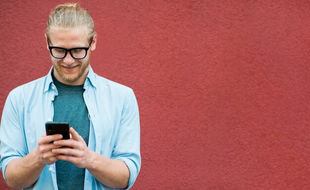 Front view of smiley man with copy space