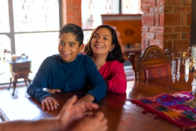 Free photo front view smiley mexican family