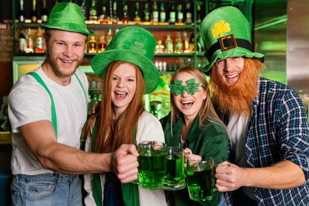 Front view of smiley people celebrating st. patrick's day