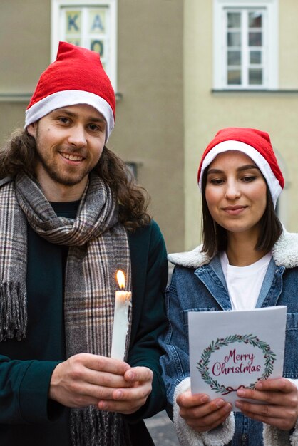 Front view smiley people with candle