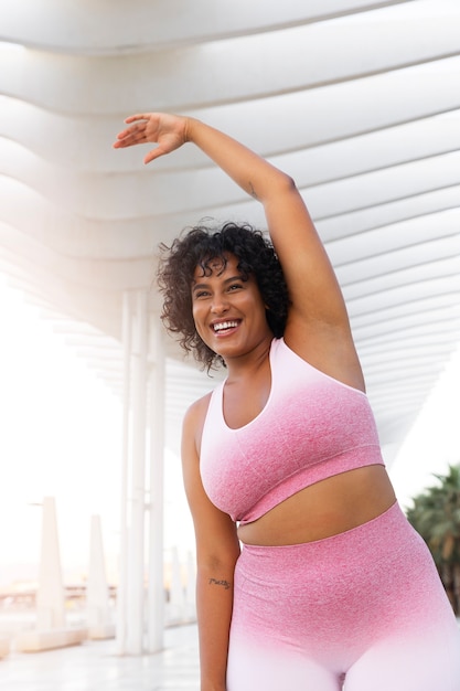 Front view smiley woman exercising