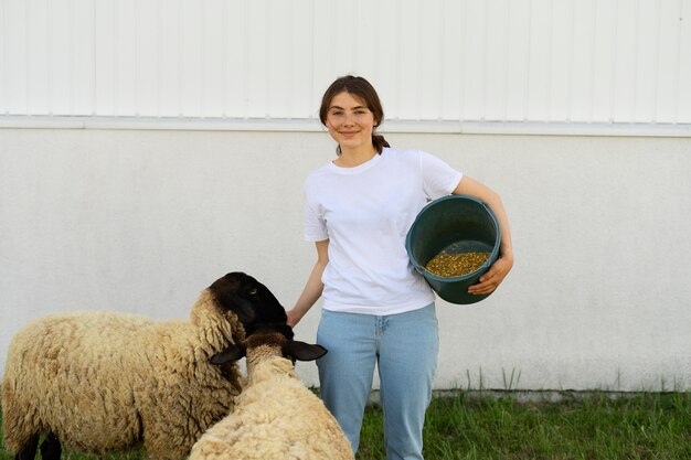 Front view smiley woman holding bucket