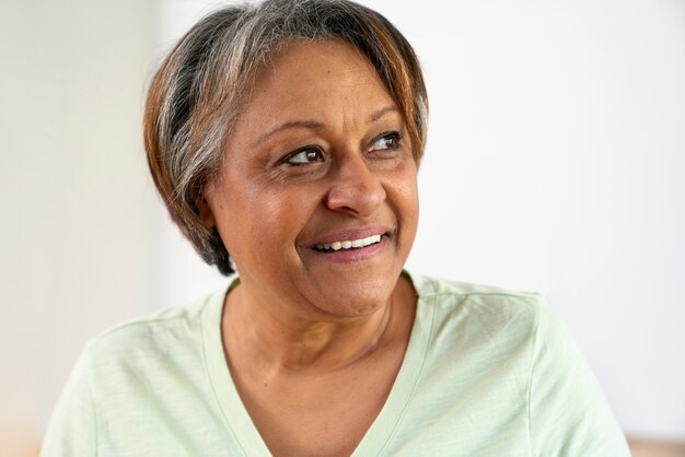 Front view smiley woman indoors