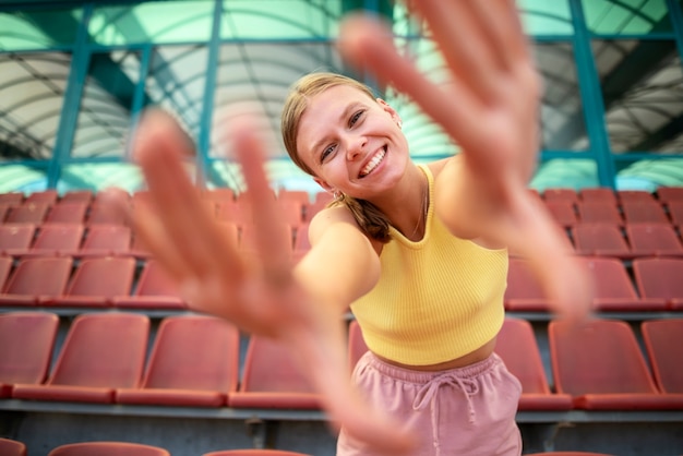 Free photo front view smiley woman posing