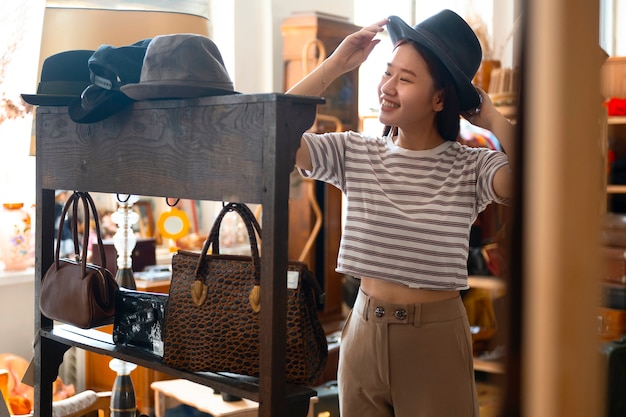 Front view smiley woman wearing hat