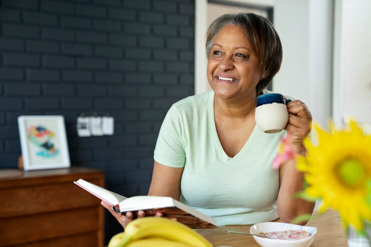 Free Photo front view smiley woman with book