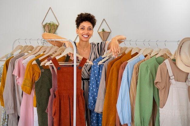 Front view smiley woman with clothes