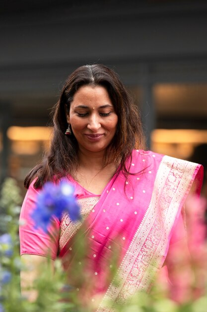 Front view smiley woman with sari