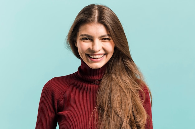 Front view smiling woman in studio