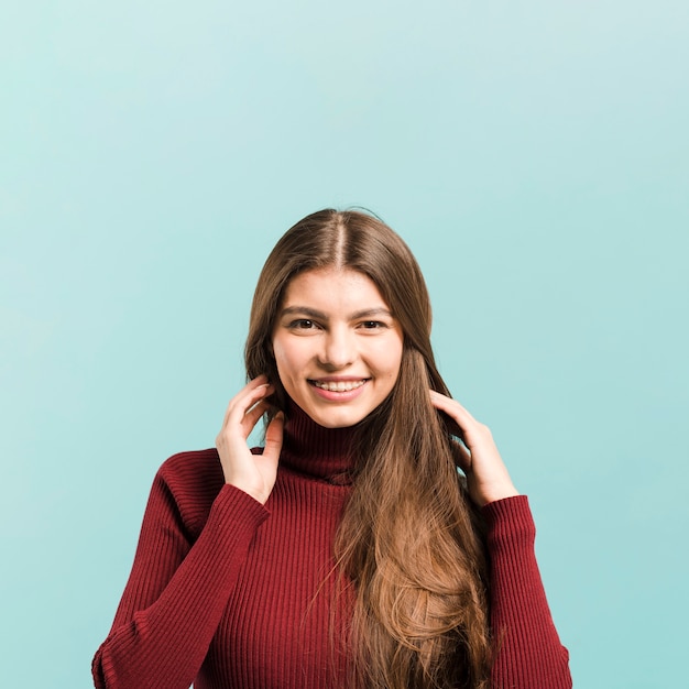 Front view smiling woman in studio