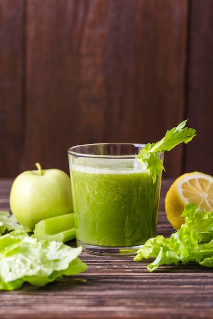 Front view smoothie glass with apple and salad