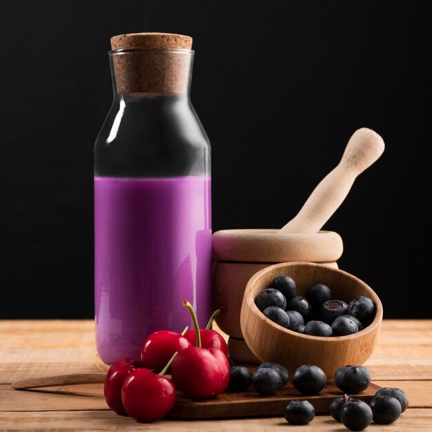 Front view smoothie with cherries and blueberries