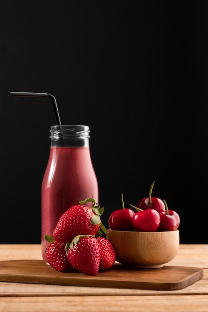 Front view smoothie with cherries and strawberries