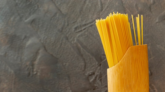 Front view of spaghetti on plain background
