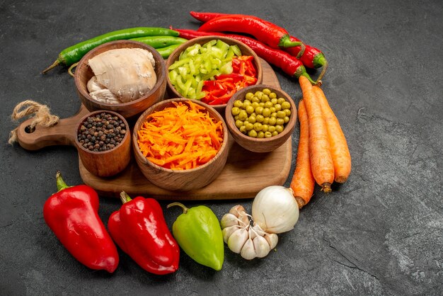 Front view spicy peppers with beans chicken and carrot on dark table color salad ripe fresh