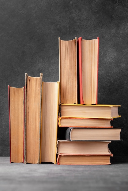 Free photo front view of stack of books