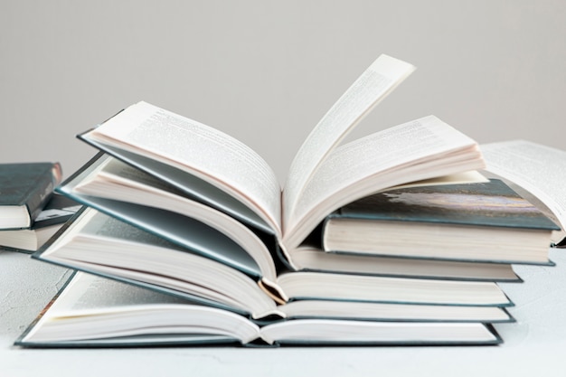 Front view stacked open books