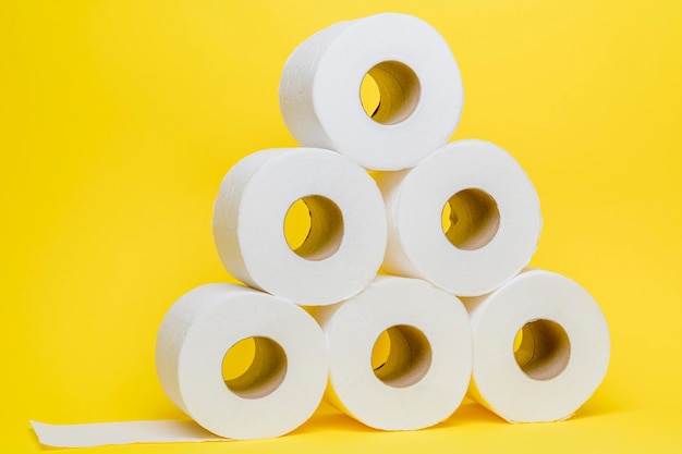 Free photo front view of stacked toilet tissue paper