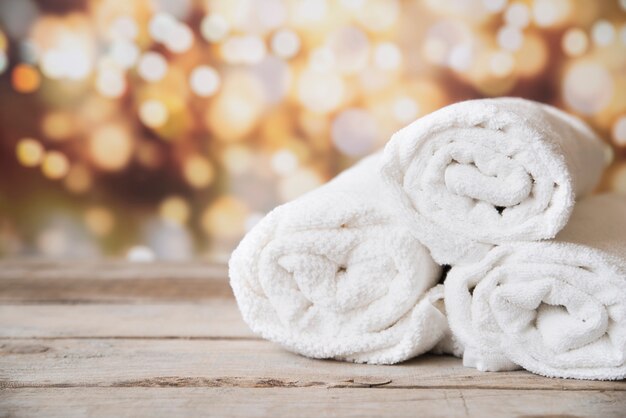 Front view stacked towels with bokeh background