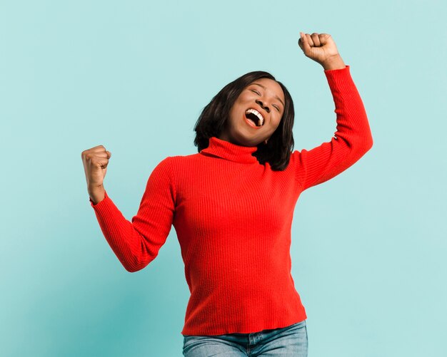 Front view strong woman in studio