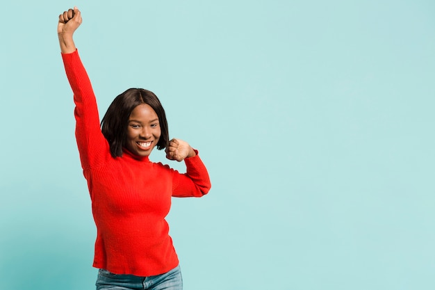 Front view strong woman in studio