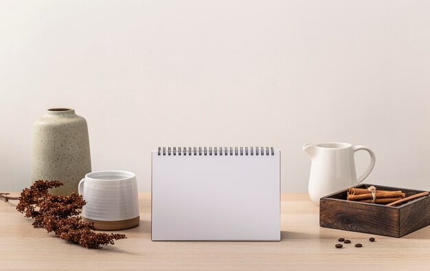 Front view of table with calendar and coffee mug