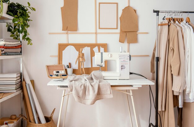 Front view of tailoring studio with sewing machine and garments