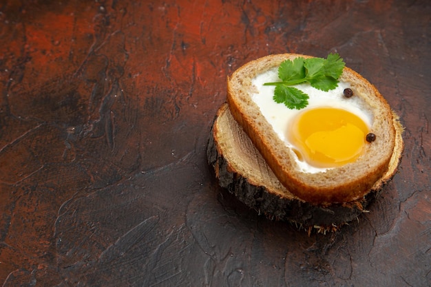 Front view tasty egg toast on dark brown background breakfast food photo morning meal color lunch