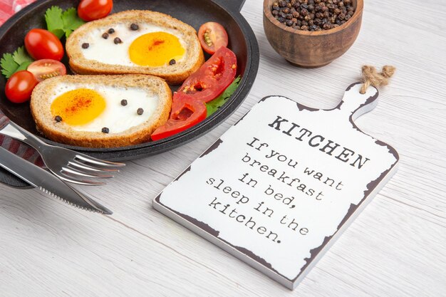 Front view tasty egg toasts inside pan on light background breakfast lunch color food photo morning salad meal