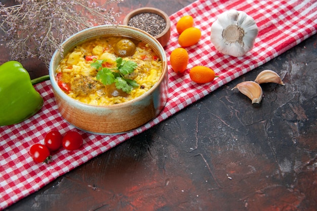 Front view tasty meat soup with potatoes and rice inside little plate on dark surface dish dinner table horizontal meat cooking food meal cuisine